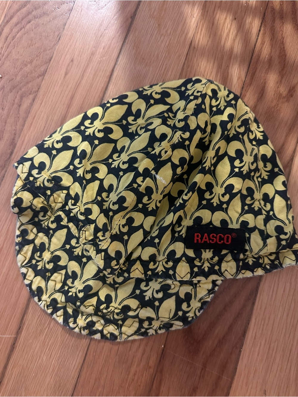 Rasco Yellow and Black Fleur-de-Lis Scrub Cap